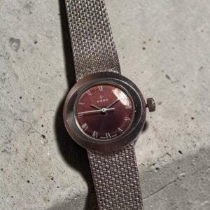 Rado - Red sunburst dial